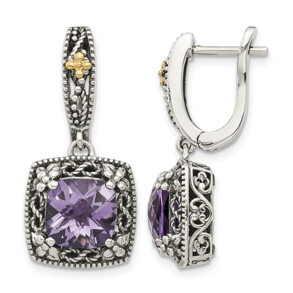 Pair of silver drop earrings with ornate filigree designs, featuring cushion-cut amethyst stones surrounded by decorative scrollwork and beaded borders.