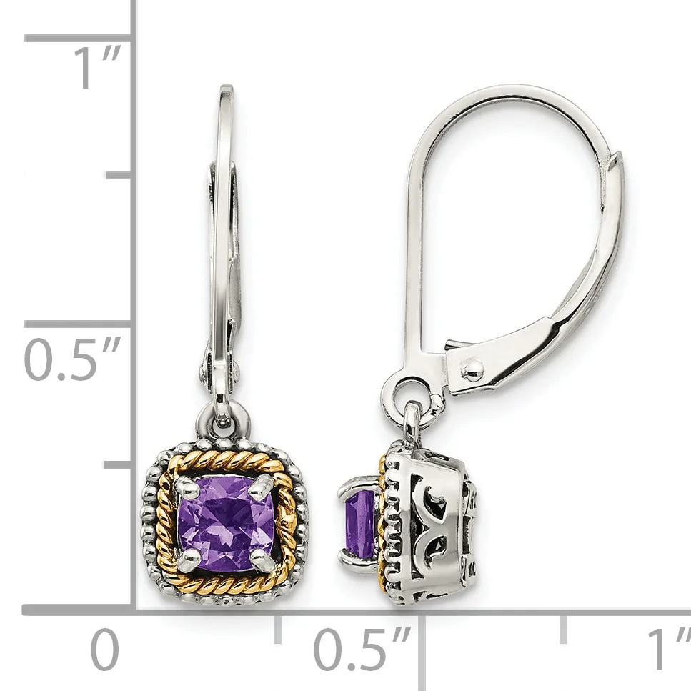 Pair of silver and gold-tone lever-back earrings with square purple amethyst stones surrounded by twisted metal bezels, shown next to a ruler measuring approximately one inch in length.
