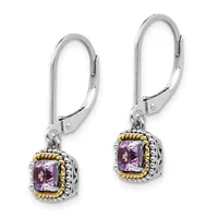 Pair of silver and gold dangle earrings with purple square gemstones set in ornate bezels with twisted gold detailing, shown against a white background.