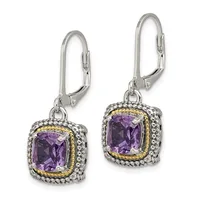 Pair of silver and gold two-tone dangle earrings with cushion-cut purple amethyst stones surrounded by decorative beaded borders.