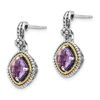 Pair of silver and gold-tone drop earrings with purple faceted teardrop stones surrounded by beaded and twisted rope detailing, shown from the front.