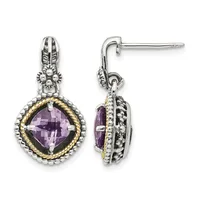 A pair of silver drop earrings with gold-toned rope detailing, each featuring a cushion-cut faceted amethyst stone surrounded by decorative beading, shown from front and side views.