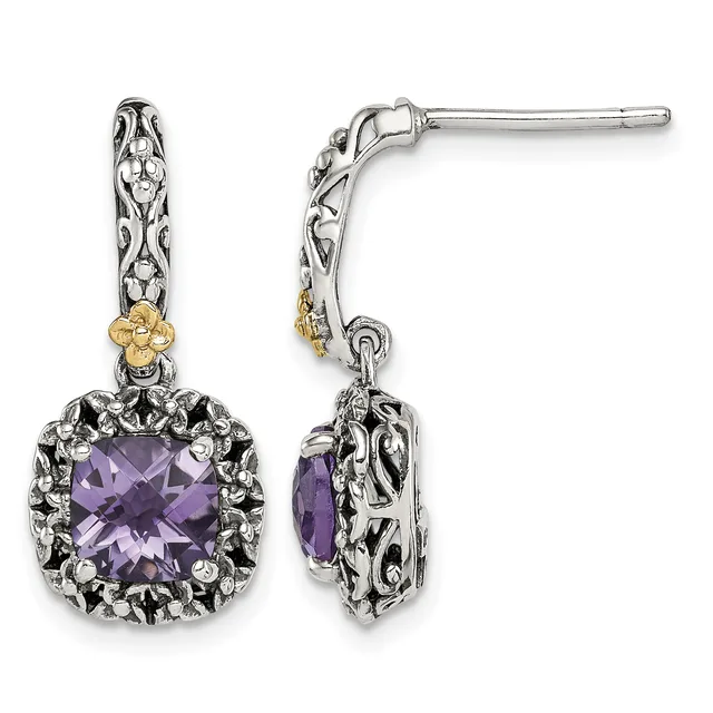 Pair of ornate silver drop earrings with purple faceted gemstones, filigree details, and gold-tone accents on posts.