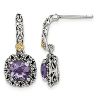 Pair of ornate silver drop earrings with purple faceted gemstones, filigree details, and gold-tone accents on posts.