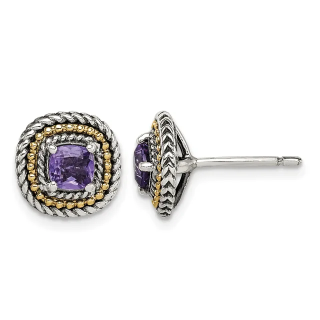 Pair of round stud earrings with purple amethyst centers surrounded by twisted silver bands and gold beaded details, shown from front and side views.