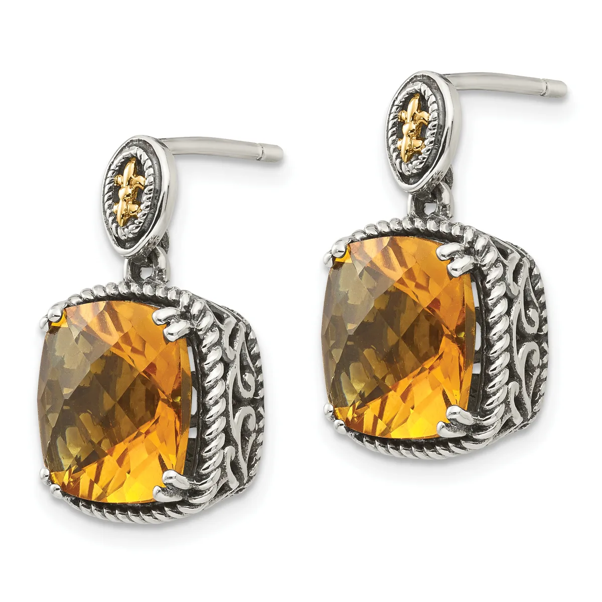 Pair of silver dangle earrings with twisted rope borders, cushion-cut amber stones, and small gold-accented oval medallions at the posts.