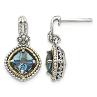 Pair of silver and gold-tone drop earrings with cushion-cut blue topaz stones surrounded by beaded and twisted rope borders, shown from front and side views.