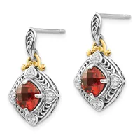A pair of two-tone sterling silver and gold drop earrings featuring square-cut red gemstones surrounded by diamonds and ornate scrollwork, shown from the front.