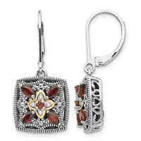 Pair of ornate square drop earrings with lever backs, featuring red garnet stones arranged around a gold-toned four-pointed star center, set in silver with decorative beaded borders, shown from front and side views.
