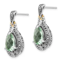 A pair of ornate silver drop earrings with pear-shaped green gemstones, featuring detailed filigree work and gold-tone accents on the posts.