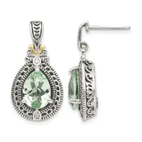 A pair of ornate silver and gold teardrop earrings with green faceted stones surrounded by detailed filigree patterns and small diamond accents, shown from front and side views.