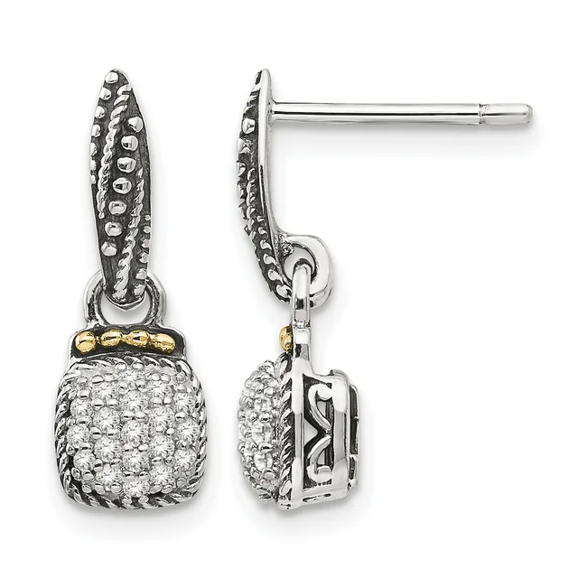 Pair of silver dangle earrings with ornate textured posts, gold-tone accent bands, and cushion-shaped pendants paved with round diamonds, shown from front and side views.