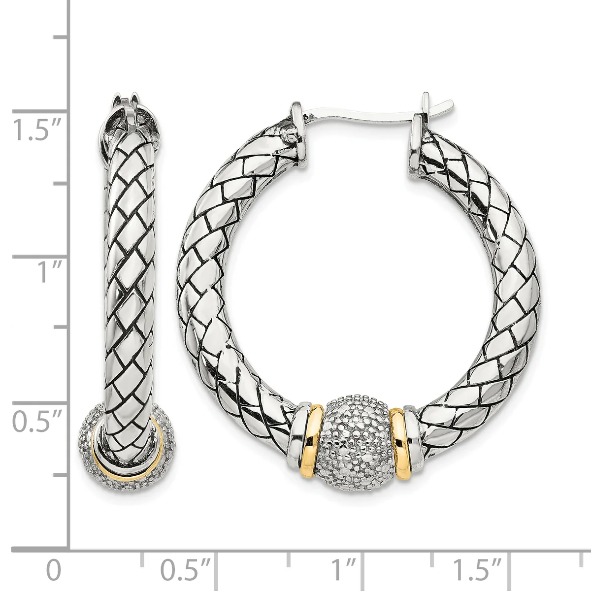 Silver and gold twisted hoop earrings with a diamond-encrusted barrel bead accent, shown on a measurement scale indicating approximately 1.5 inches in length.