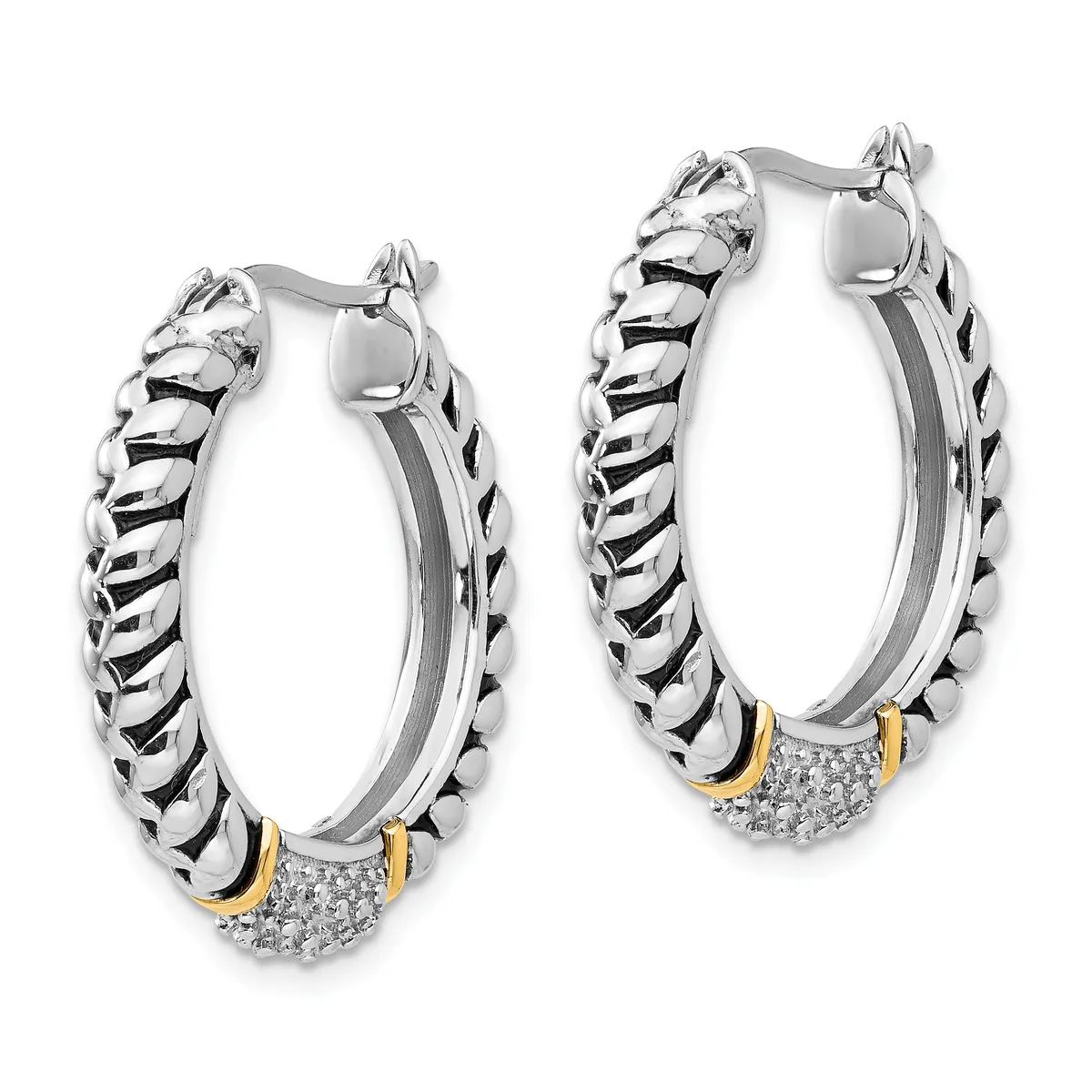 Pair of silver twisted hoop earrings with gold-tone accents and diamond pave sections at the bottom, shown from the front.