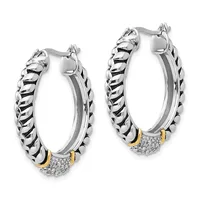 Pair of silver twisted hoop earrings with gold-tone accents and diamond pave sections at the bottom, shown from the front.