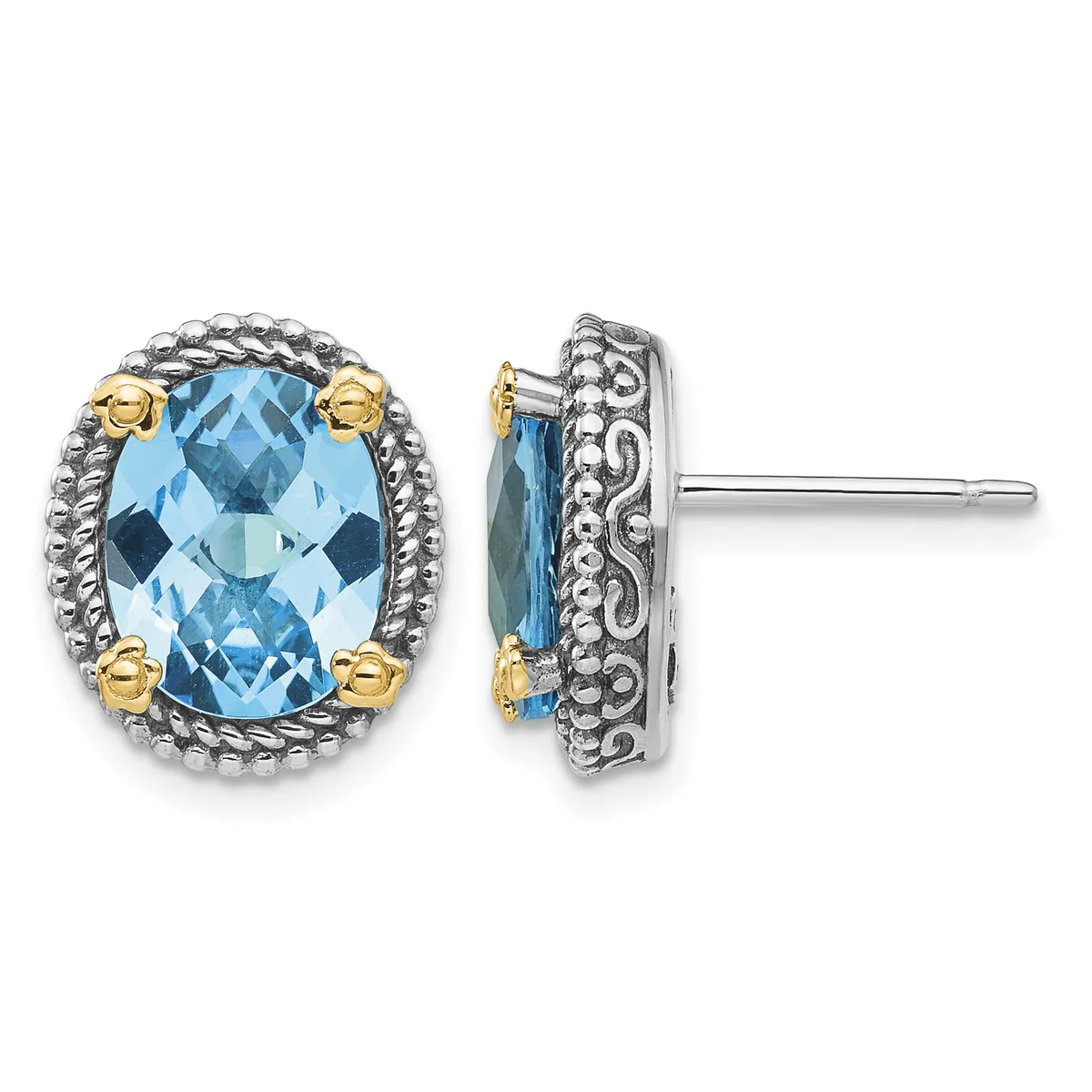 Pair of oval stud earrings featuring faceted blue topaz stones set in ornate silver frames with gold-tone accents, shown from front and side views.