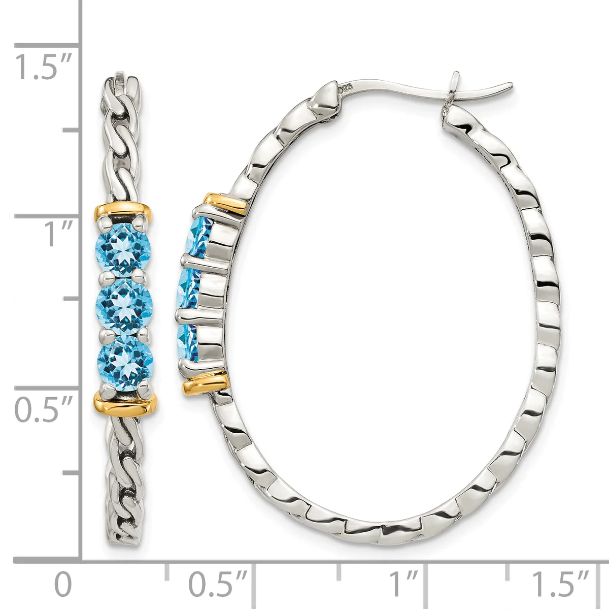 A pair of silver hoop earrings with three blue topaz stones and gold-tone accents, displayed next to a measurement scale showing approximately 1.5 inches in length.