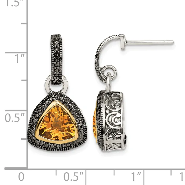 Pair of silver dangle earrings with triangular citrine stones surrounded by marcasite, displayed against a measurement scale showing approximately one inch in length.