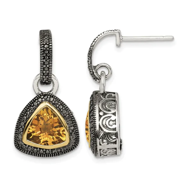 Pair of silver drop earrings with triangular citrine stones surrounded by marcasite halos and ornate scroll detailing, shown from front and side views.