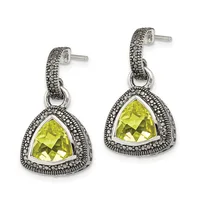 Pair of silver dangle earrings with triangular faceted yellow-green stones surrounded by ornate beaded bezels and topped with textured curved posts.