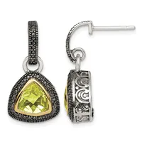 Pair of silver drop earrings with yellow-green triangular gemstones surrounded by marcasite and decorative scrollwork, shown from front and back views.