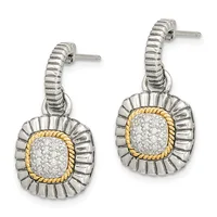 A pair of silver drop earrings with textured posts and cushion-shaped pendants featuring diamond pavé centers surrounded by fluted silver frames with gold-tone twisted borders.