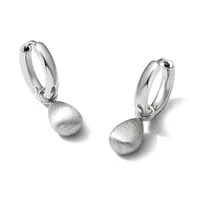 A pair of silver hoop earrings with matte finish spherical pendants hanging from polished curved hoops.