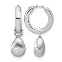 A pair of silver hoop earrings with polished rounded hoops and textured teardrop-shaped pendants hanging from the bottom.