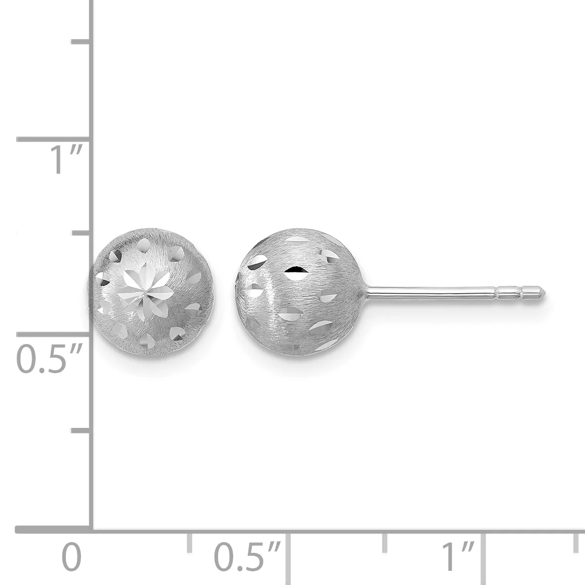 Two spherical silver stud earrings with textured satin finish and decorative cutout patterns, shown against a measurement scale.