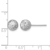 Two spherical silver stud earrings with textured satin finish and decorative cutout patterns, shown against a measurement scale.