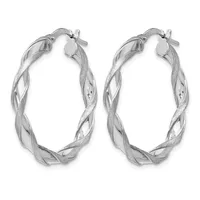 A pair of silver twisted hoop earrings with a textured and polished finish, shown against a white background.