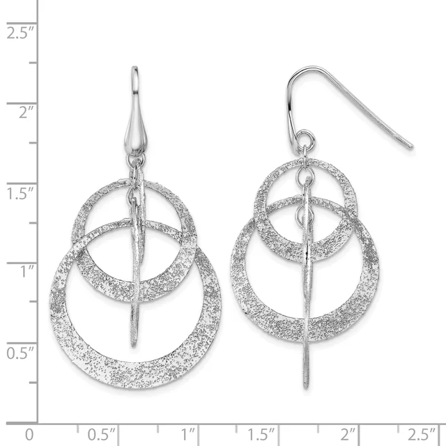 Pair of silver textured dangle earrings with concentric circles and vertical bars, displayed against a measurement scale showing approximately 2.25 inches in length.
