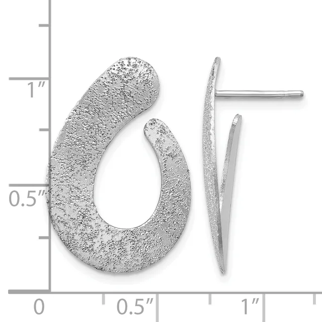 Pair of textured silver hoop earrings shown next to a ruler measuring approximately one inch in height and half inch in width.