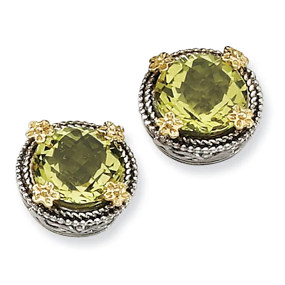 Pair of stud earrings featuring cushion-cut yellow-green gemstones set in silver with gold-tone filigree detailing around the bezels.