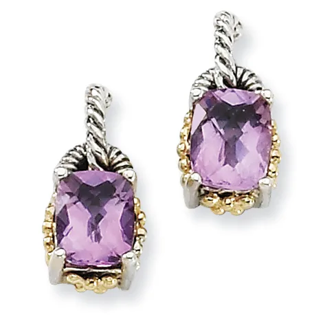 A pair of matching amethyst drop earrings with twisted silver tops, gold beaded details, and cushion-cut purple stones in silver and gold settings.