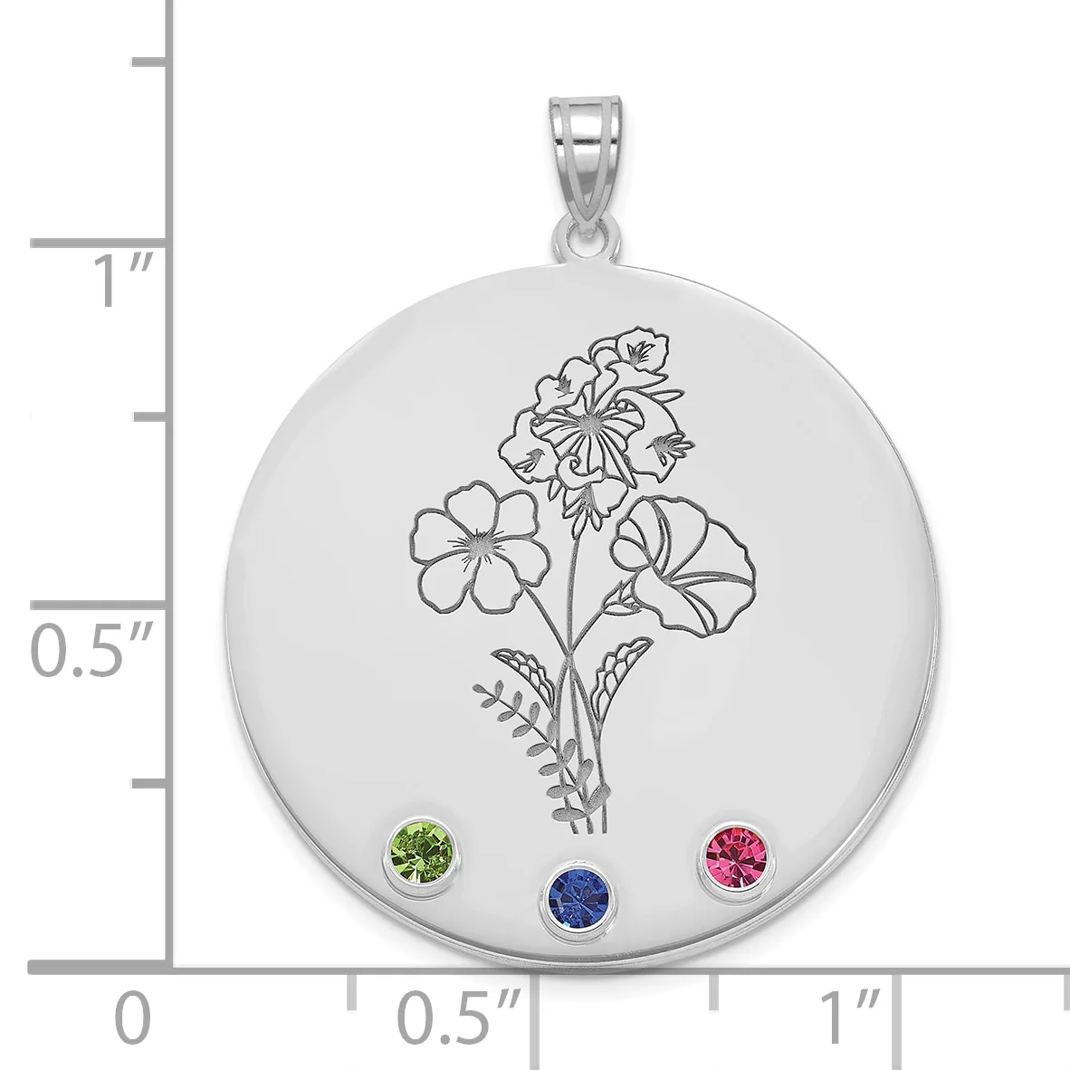 Silver pendant with engraved botanical flower design and four colored gemstones (green, blue, pink, and one additional stone) arranged at the bottom, shown next to a ruler for scale.