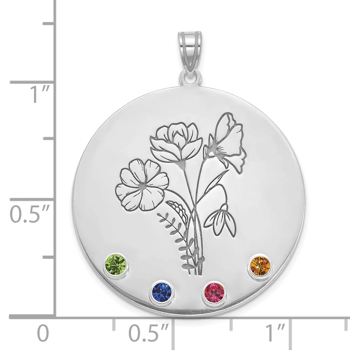 Silver circular pendant with engraved floral design and four round colored gemstones positioned at cardinal points, shown next to a ruler for scale.
