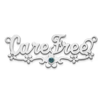 Silver ornament pendant with decorative flourishes and a blue gemstone in the center, spelling out text in an ornate script font.