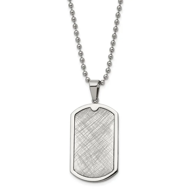 A stainless steel dog tag pendant with a crosshatch pattern hangs from a ball chain necklace against a white background.