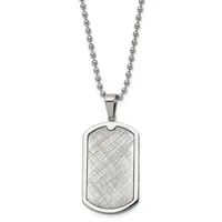 A stainless steel dog tag pendant with a crosshatch pattern hangs from a ball chain necklace against a white background.