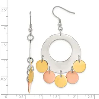 A pair of silver-tone earrings with white enamel rings suspended from fish hooks, decorated with dangling yellow and peach enamel circles, shown next to a measurement scale.