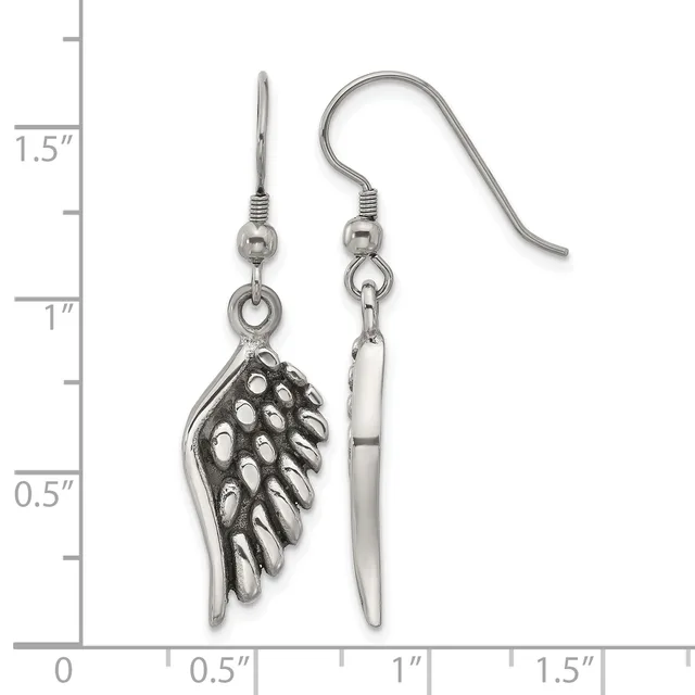 A pair of silver-tone dangle earrings with textured wing-shaped pendants and matching ear wires, displayed against a measurement scale showing approximately 1.5 inches in length.