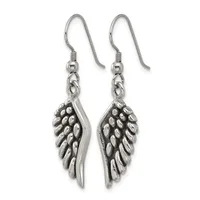 A pair of silver-toned fish hook earrings with detailed wing-shaped pendants hanging from decorative connectors.