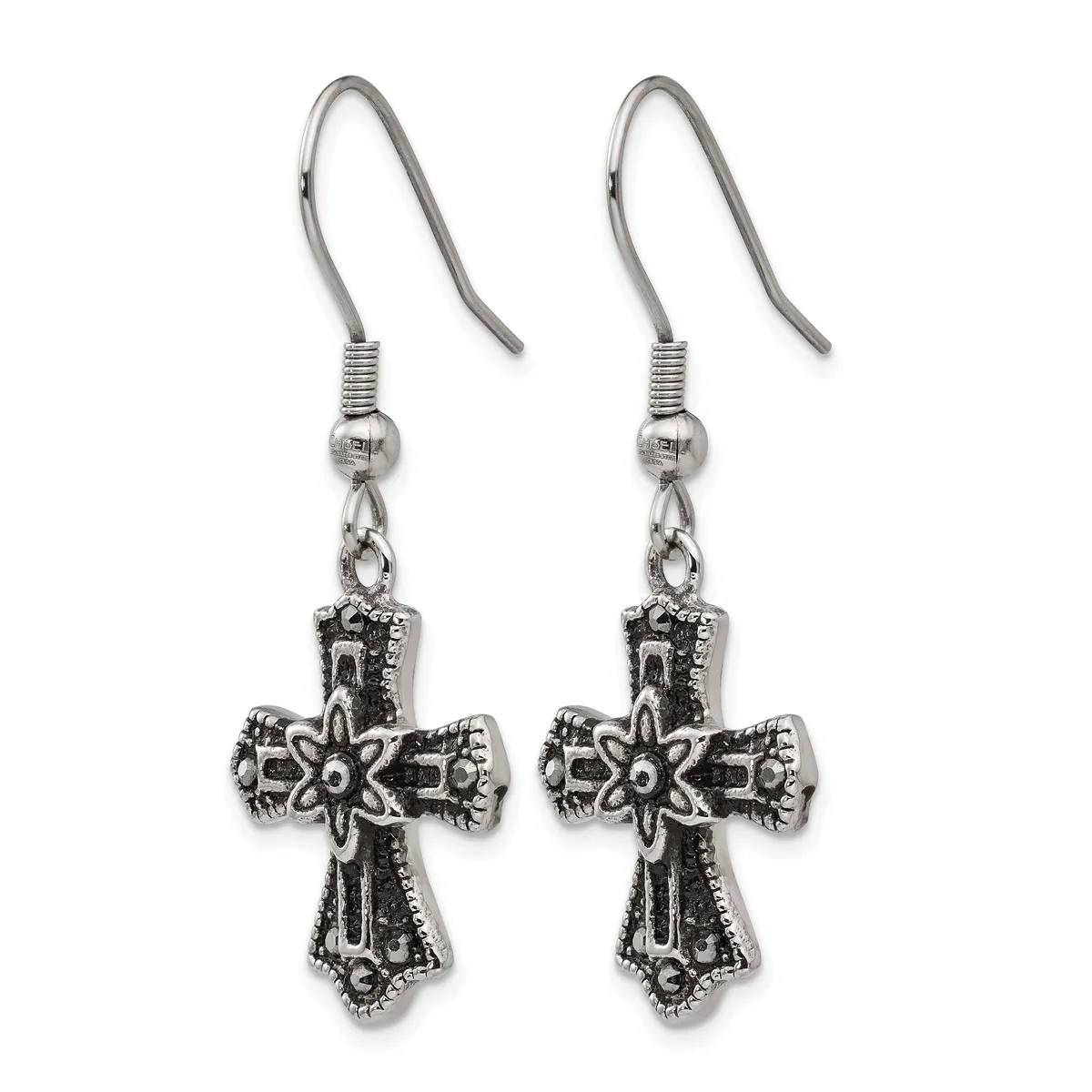 A pair of ornate silver-tone cross earrings with decorative scrollwork and a star center, suspended from fish hook wires with beaded accent beads.
