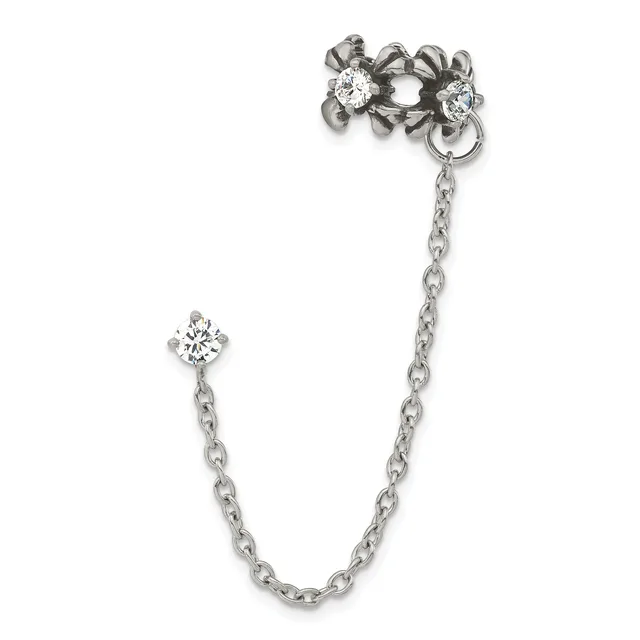 A silver-toned chain bracelet with a decorative bow-shaped clasp adorned with cubic zirconia stones at the top and a single cubic zirconia pendant hanging from the chain.