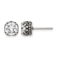 Pair of silver stud earrings with large round clear cubic zirconia stones in ornate filigree settings, shown from front and back views.