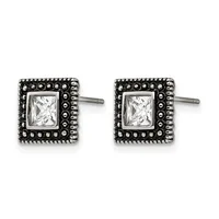 Pair of square stud earrings with princess-cut cubic zirconia centers surrounded by decorative beaded borders in oxidized silver, shown from the front.