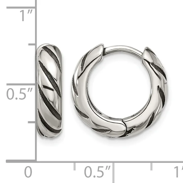 Pair of silver-toned hoop earrings with twisted diagonal stripe pattern, shown next to a ruler indicating approximately 0.5 inch diameter.