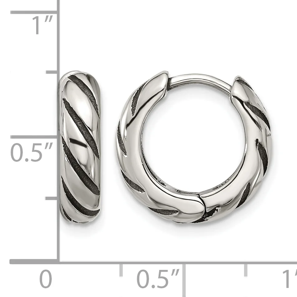 Pair of silver-toned hoop earrings with twisted diagonal stripe pattern, shown next to a ruler indicating approximately 0.5 inch diameter.