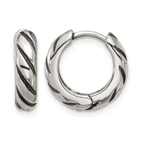 Pair of silver huggie hoop earrings with diagonal black enamel stripes, shown from front and side angles.